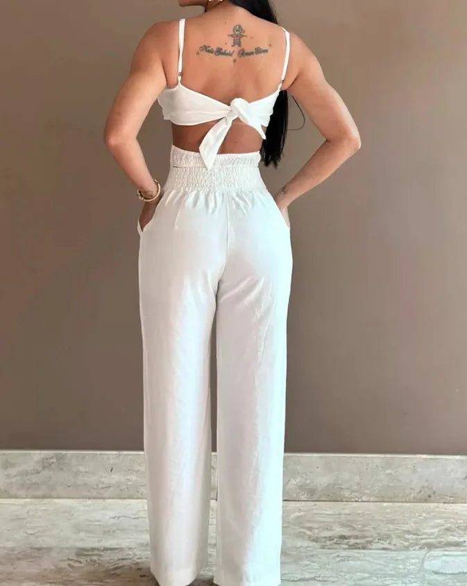 Summer Spaghetti Strap Fashion Jumpsuit New Women Floral Pattern Shirred Hollow Out Casual Asymmetricsal Neck Backless Jumpsuits