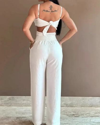 Summer Spaghetti Strap Fashion Jumpsuit New Women Floral Pattern Shirred Hollow Out Casual Asymmetricsal Neck Backless Jumpsuits