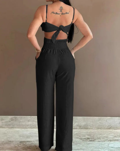 Summer Spaghetti Strap Fashion Jumpsuit New Women Floral Pattern Shirred Hollow Out Casual Asymmetricsal Neck Backless Jumpsuits