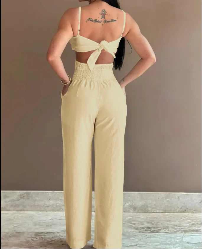 Summer Spaghetti Strap Fashion Jumpsuit New Women Floral Pattern Shirred Hollow Out Casual Asymmetricsal Neck Backless Jumpsuits