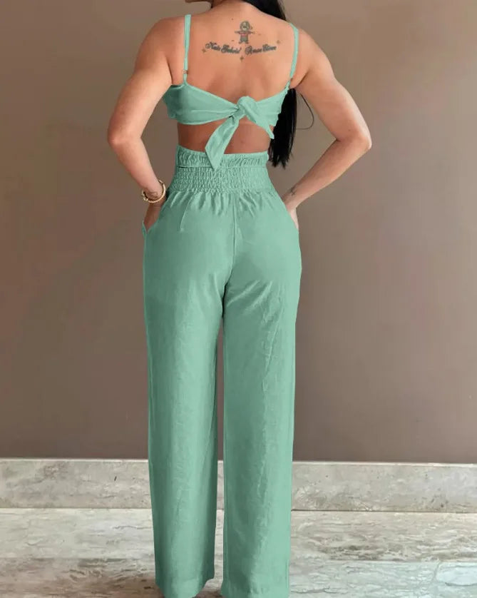 Summer Spaghetti Strap Fashion Jumpsuit New Women Floral Pattern Shirred Hollow Out Casual Asymmetricsal Neck Backless Jumpsuits