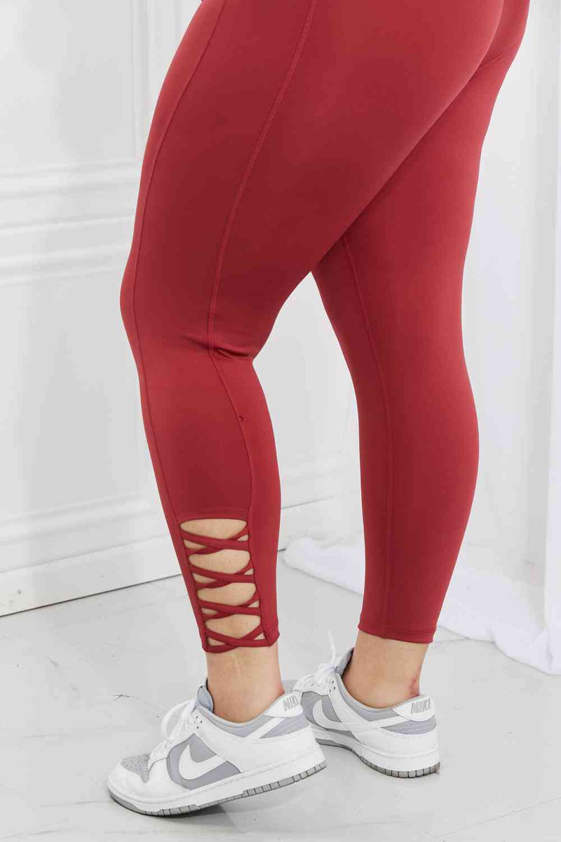 Yelete Ready for Action Full Size Ankle Cutout Active Leggings in Brick Red  - Brick Red 2XL