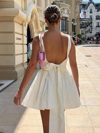 New women's sexy backless strappy bow evening dress